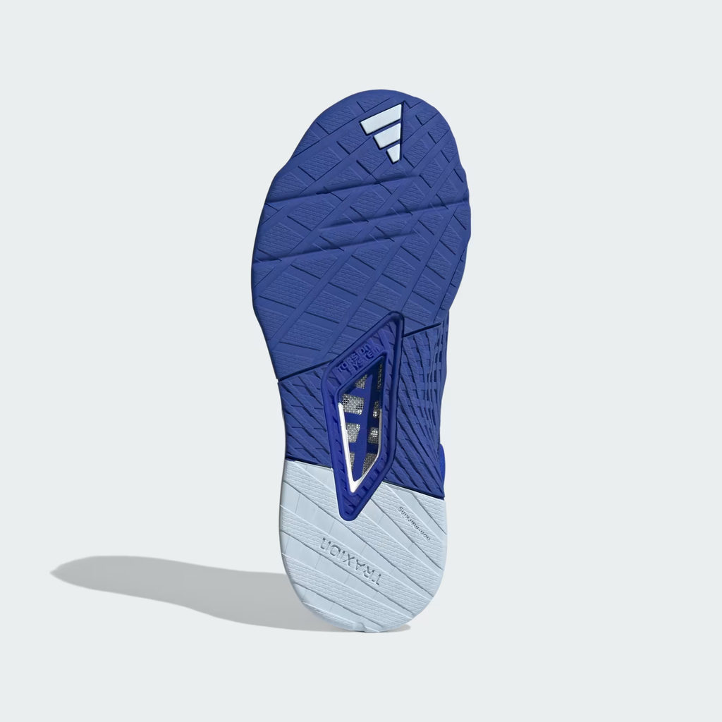 Adidas Dropset 3 ID8636 - Rear 3/4 Shot on Light Grey Background showing Lucid Blue Structured Heel Counter with TRAINING Embossed Text, Blue Spark Metallic Three Stripes on Lateral Quarter Panel, HEAT.RDY Engineered Knit Upper, Chalk White Heel Midsole Wedge & Blue Rubber Outsole