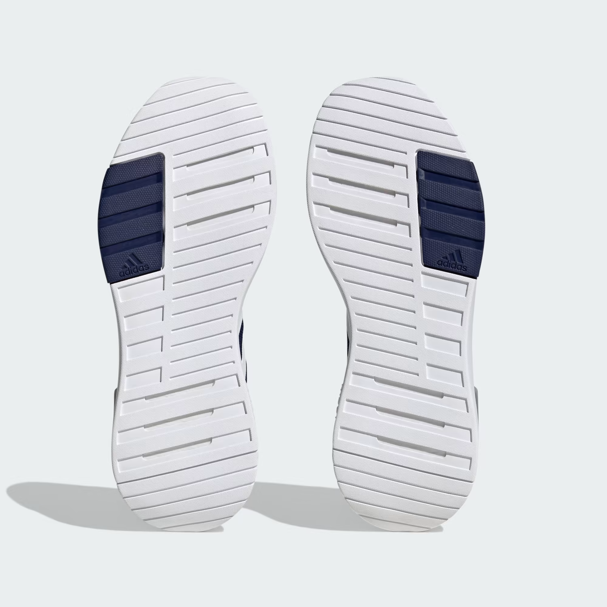 Adidas Racer TR23 IG7325 - Front 3/4 Pair Shot showing Three White Stripes, Air Heel Bubble & White Cloudfoam Midsole