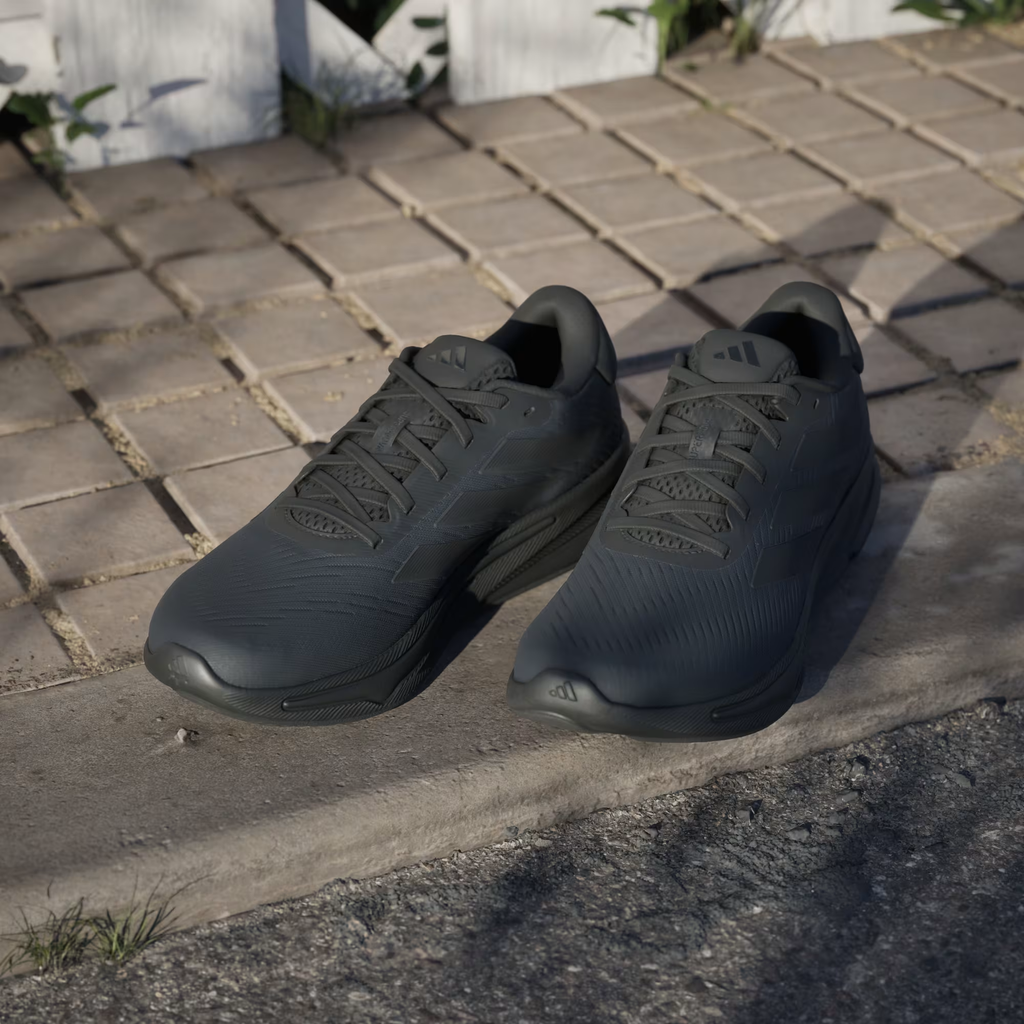 Adidas Supernova Ease IH2580 - Clean Lateral Profile on Wooden Slats showing Full Silhouette, Tonal Three Stripes & Supernova Midsole