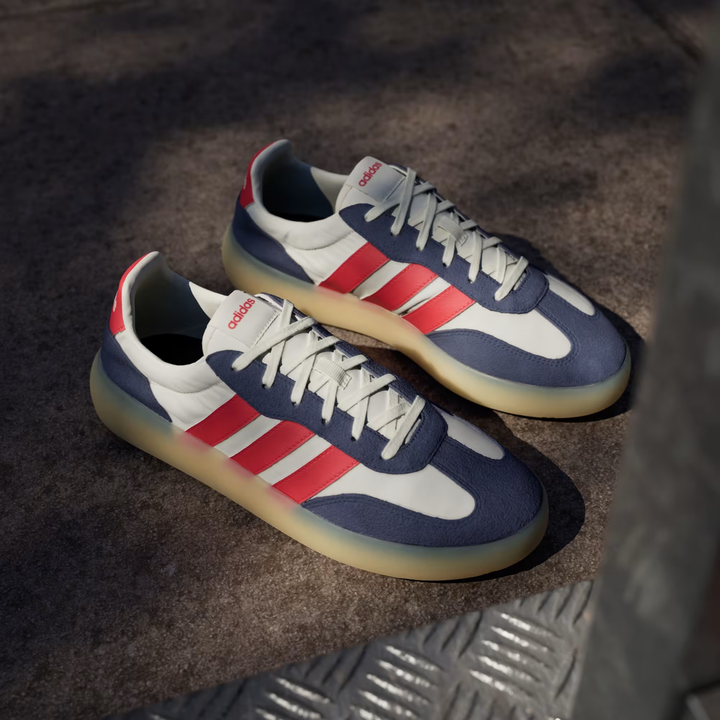 Adidas Barreda Decode JP9667 - Clean Single Lateral Profile on Copper Rail in Off White/Pure Ruby/Dark Blue showing Full Silhouette, Bold Ruby Three Stripes, Dark Blue Suede Overlays & Gum Midsole
