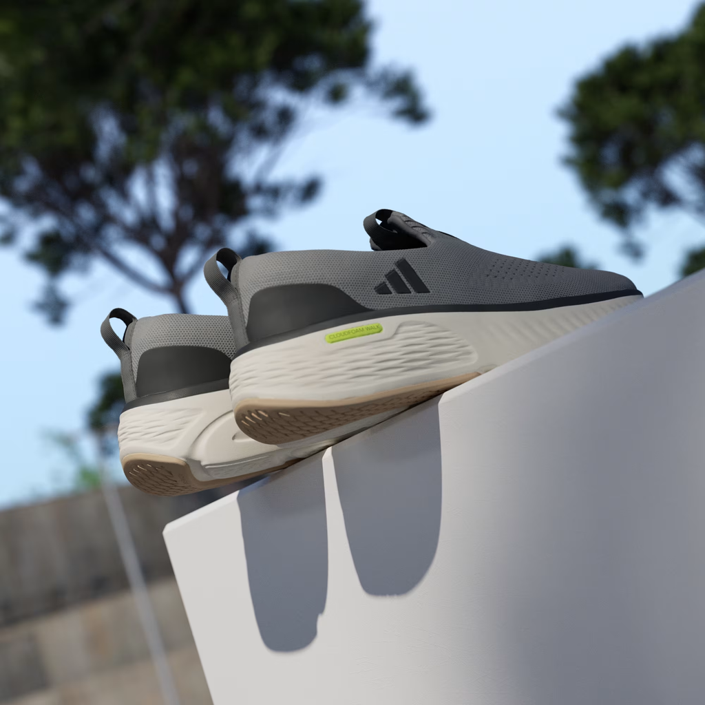 Adidas Cloudfoam Go Lounger ID4021 - Rear Pair Shot on White Ledge showing Grey Three Knit Upper, Dark Grey Three Stripes, Dual Pull Tabs, Neon Yellow Cloudfoam Walk Midsole Branding & Off White Midsole with Outsole Visible