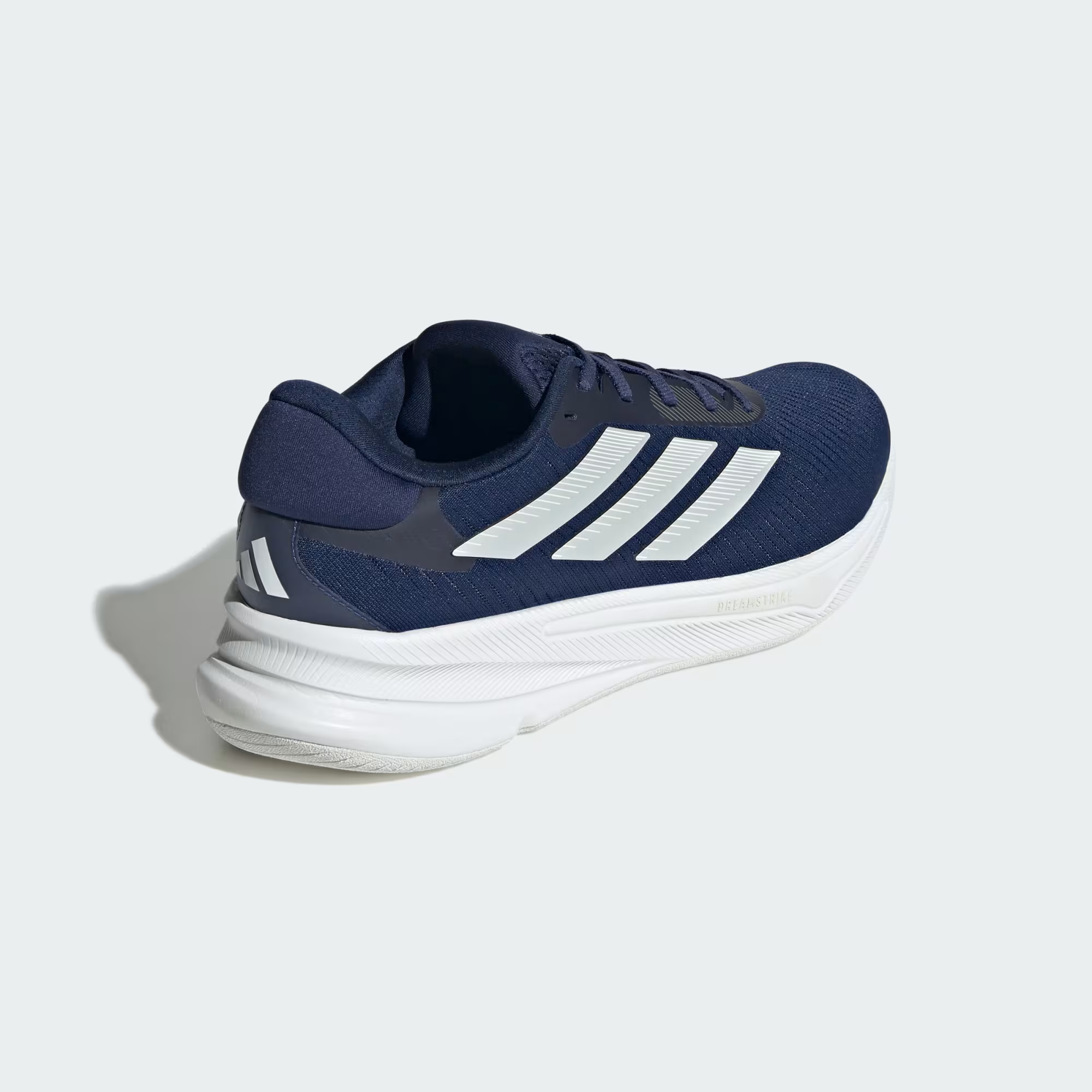 Adidas Supernova Ease JH8560 - Clean Lateral Profile on Light Grey Background showing Full Dark Blue Silhouette, Zero Metallic Three Stripes, Supernova Ease Midsole Text & Chunky White Midsole with White Outsole