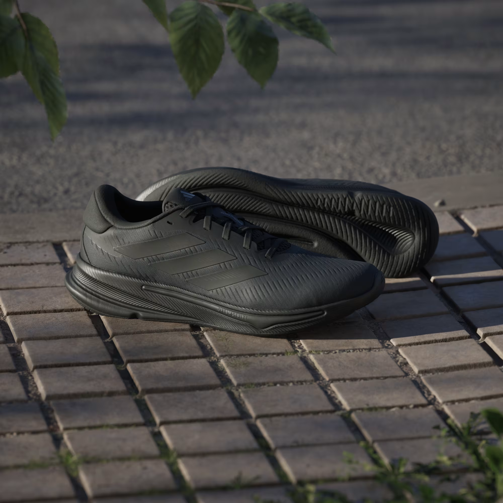 Adidas Supernova Ease IH2580 - Lateral Heel Close-up showing Tonal Three Stripes, Carbon Midsole Detailing & Padded Collar