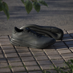 Adidas Supernova Ease IH2580 - Lateral Heel Close-up showing Tonal Three Stripes, Carbon Midsole Detailing & Padded Collar
