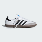 Adidas Samba OG B75806 - Outsole Close-up showing Full Gum Rubber Outsole with Pyramid Traction Pattern, Circular Pivot Points, Core Black Three Stripes on Midsole Edge & Clear Granite Suede Toe Box Edge