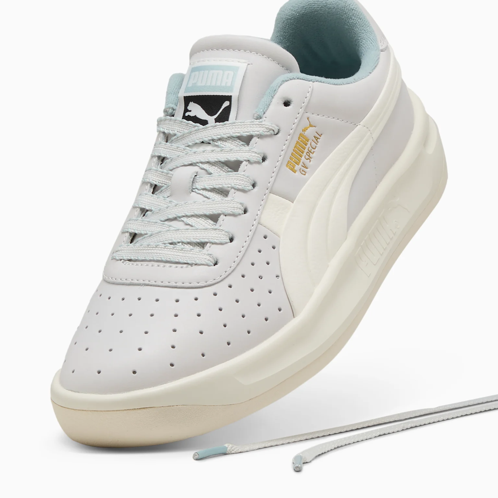 Puma GV Special 401385_01 - Lateral Forefoot Close-up showing Gold Puma Cat & GV Special Text, White Formstrip, Perforated Leather & Ice Blue Laces