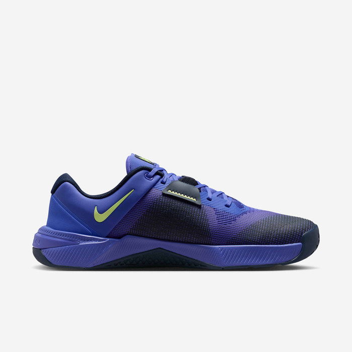 Nike Metcon 10 HJ1875-501 - Front 3/4 Pair Shot on White Background showing Persian Violet Mesh Upper, Light Lemon Twist Swoosh & M Logo on Lateral, Obsidian Forefoot Wrap Overlay, Metcon Strap with Lemon Twist Logo, Persian Violet Midsole & Obsidian Rubber Outsole