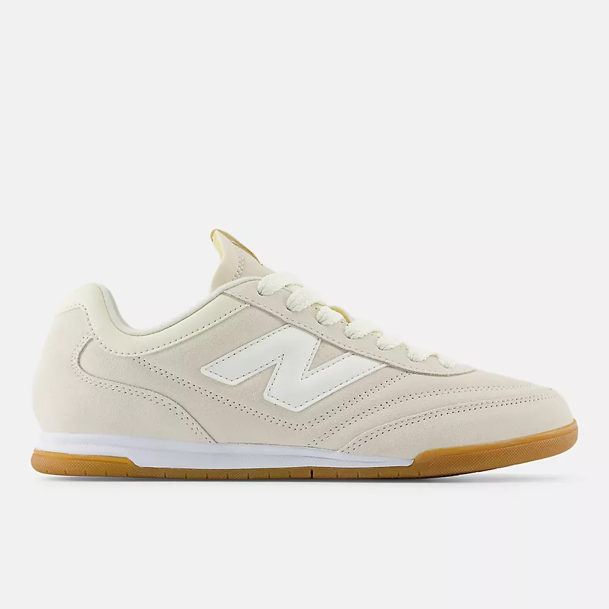 New Balance RC42 URC42EA - Clean Lateral Profile on Light Grey Background in Linen with Sea Salt showing Premium Linen Suede Upper, Perforated Toe Box & Quarter Panel, Sea Salt White NB Logo on Lateral Midfoot, Matching Linen Laces, White Midsole & Amber Gum Rubber Indoor Court Outsole