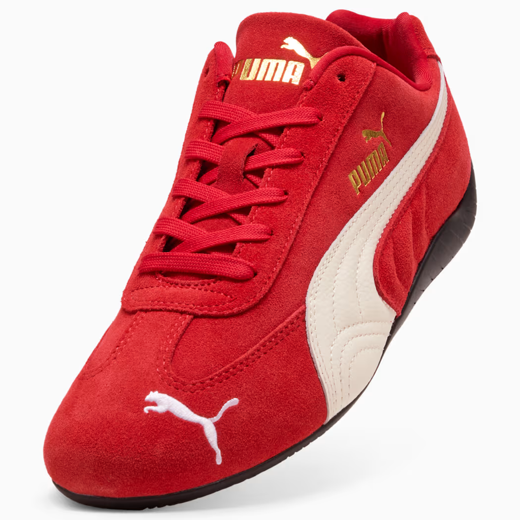 PUMA Speedcat 406329_02 - Front 3/4 Hero Shot on White Background showing For All Time Red Premium Suede Upper, PUMA White Leather Formstripe, Gold PUMA Wordmark & Cat Logo on Lateral Quarter Panel, White PUMA Cat on Toe Box, Red Flat Laces & Black Rubber Outsole