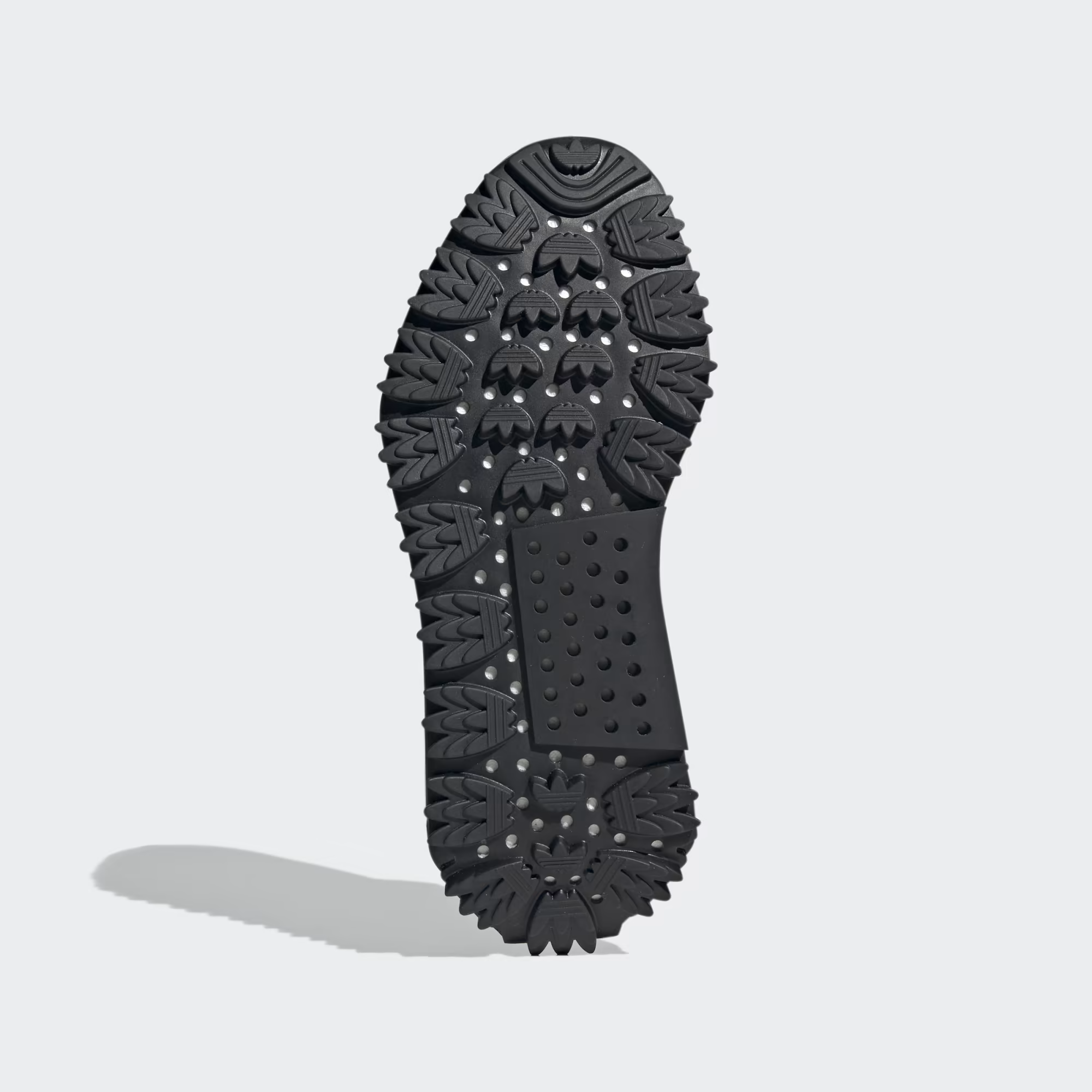 Adidas NMD_S1 FZ6381 - Rear 3/4 Shot on White Background showing Core Black Primeknit Upper, Grey Four Reflective Heel Knit Detail, Tonal Black Three Stripes, Black Boost Midsole with NMD Plug & Chunky Black Lug Outsole