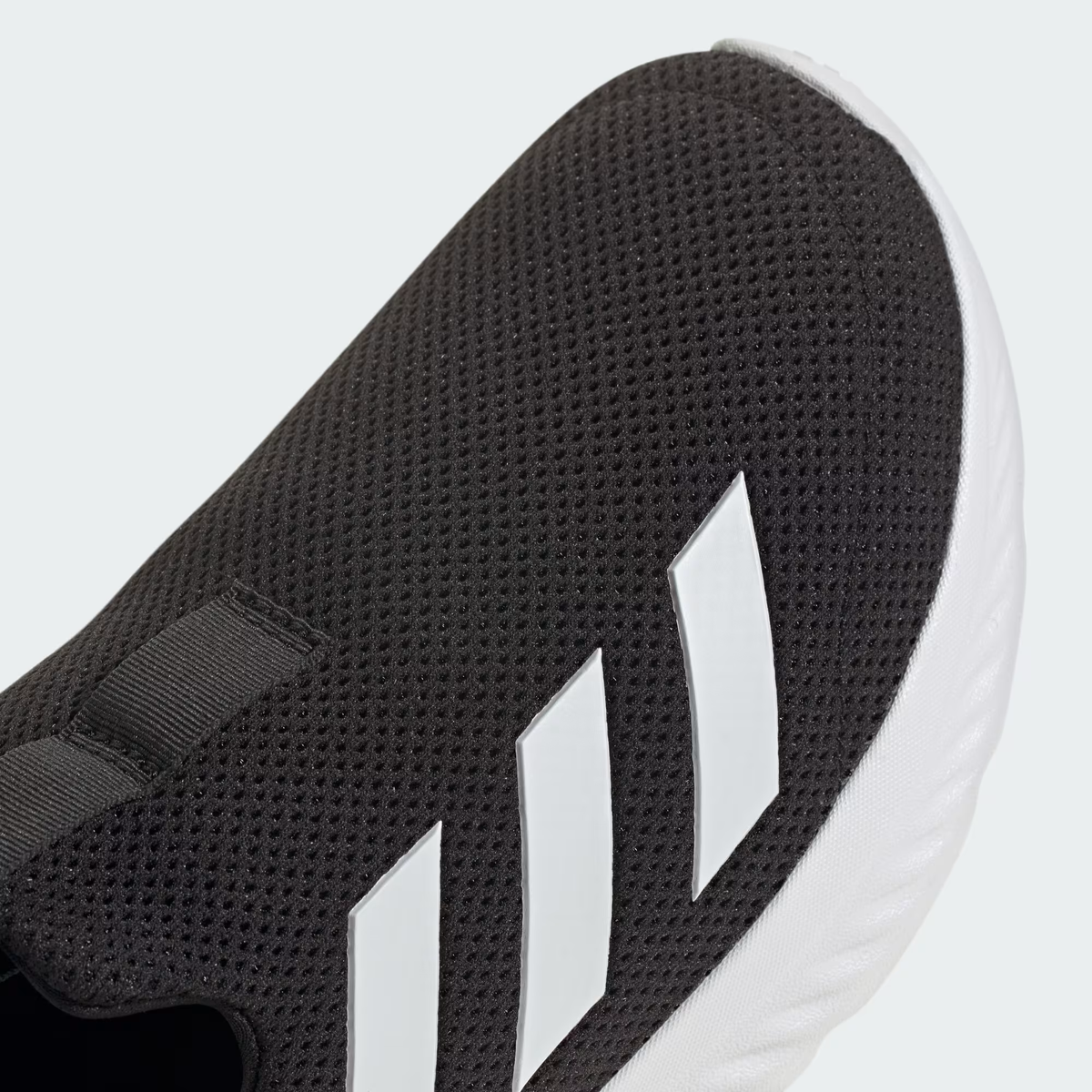 Adidas Cloudfoam Move Lounger ID6512 - Additional Lifestyle Detail Shot showing Core Black Engineered Mesh Upper & Cloud White Cloudfoam Walk Midsole Profile