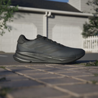 Adidas Supernova Ease IH2580 - Front 3/4 Pair Shot on Cobblestone in Core Black/Core Black/Carbon showing Tonal Three Stripes & Engineered Mesh Upper