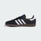 Adidas Samba OG B75807 - Toe Box & Forefoot Top-Down Close-up showing Black Suede Toe Cap Texture, Core Black Full-Grain Leather Upper, Black Flat Laces, Cloud White Three Stripes Base, Blue Adidas Originals Tongue Label with Trefoil Logo & Gum Rubber Outsole Edge