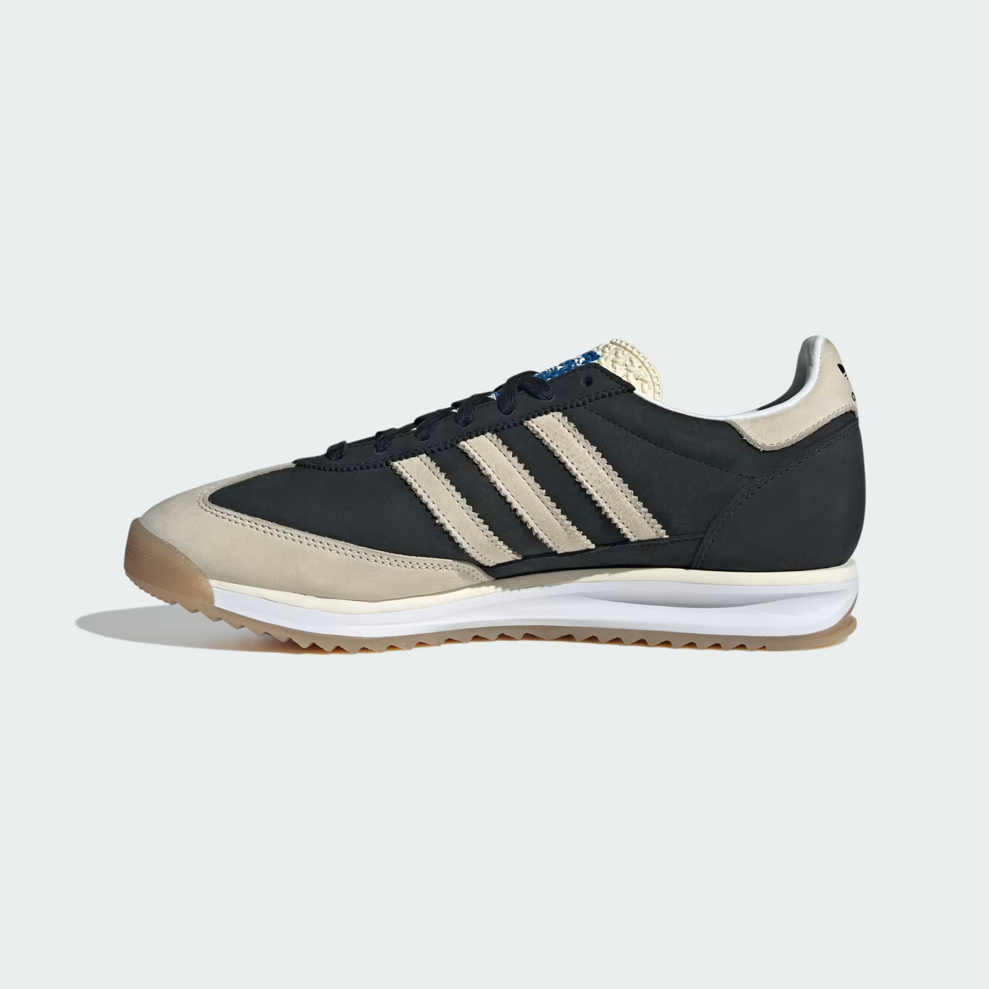 Adidas SL 72 RS JS3994 - Forefoot Close-up showing Core Black Nylon Upper, Cream Suede Toe Box Overlay, Cream Three Stripes Detail, Black Lace System & White Midsole with Gum Outsole Edge
