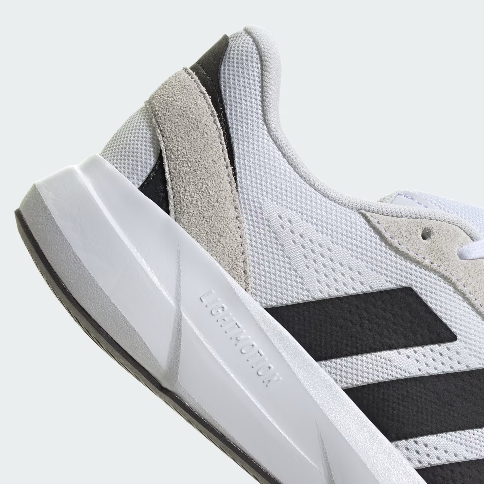 Adidas Lightshift JH9317 - Outsole Close-up showing Black Rubber Traction Pattern with White Flex Grooves & Adidas Logo
