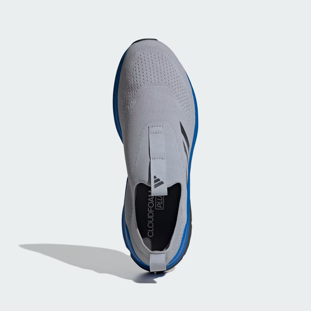 Adidas Cloudfoam Walk Sock ID4065 - Full Rubber Outsole Top-Down on Light Grey Background in Black/Bright Royal showing Segmented Multi-Zone Traction Pads with Honeycomb Texture, Flex Groove Channels, Bright Royal Adigrip Traction Zones & Adiwear Stamp on Heel