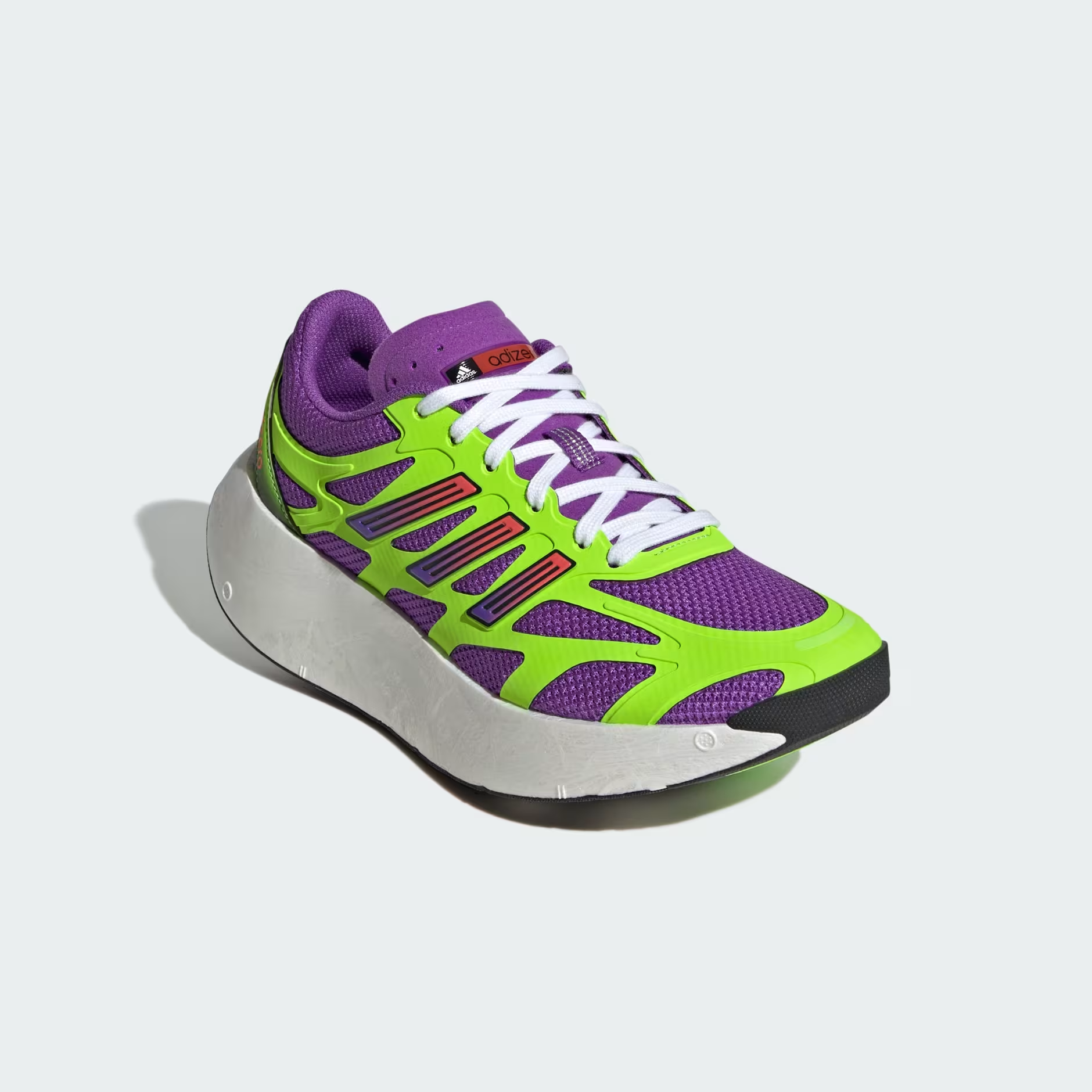 Adidas Adizero Aruku JP5566 - Front 3/4 Pair Shot on White Background with Solar Green Laces Accessory showing Active Purple Mesh, Solar Green Exoskeleton, Purple-to-Red Gradient Three Stripes, White Laces & White Swirl-Foam Midsole