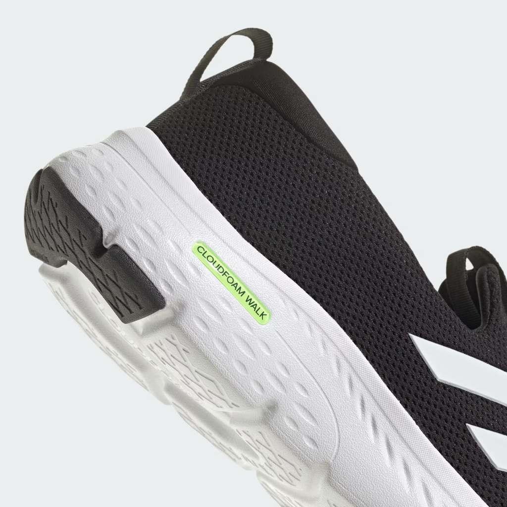 Adidas Cloudfoam Move Lounger ID6512 - Three Stripes Lateral Midfoot Close-up showing Core Black Perforated Mesh Dot Texture, Cloud White Three Diamond-Shape Stripe Overlays, Front Elastic Band Pull Tab, White Cloudfoam Walk Midsole Sidewall & Black Rubber Outsole Edge