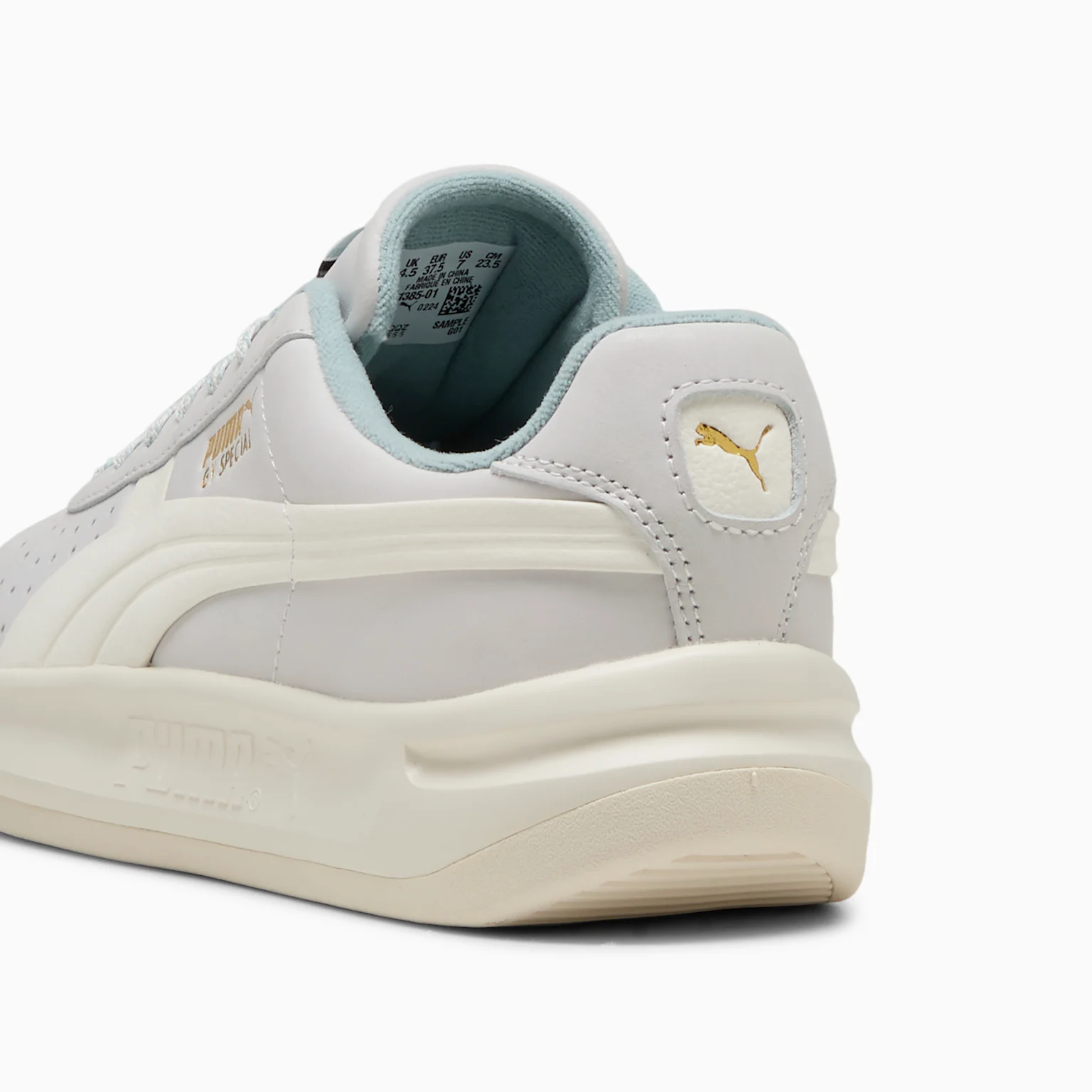 Puma GV Special 401385_01 - Heel Close-up showing Gold Puma Cat Logo, Ice Blue Padded Collar, Warm White Midsole & GV Special Text
