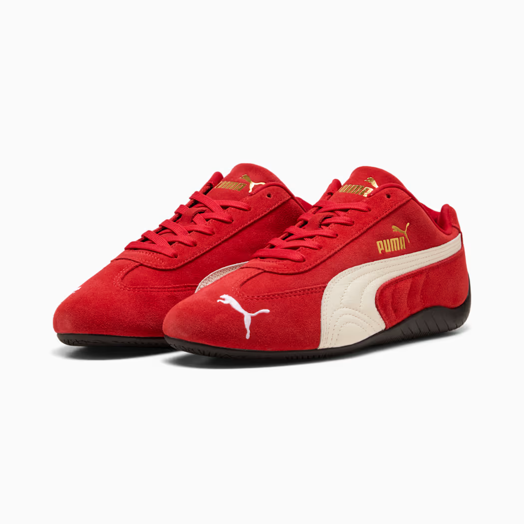 PUMA Speedcat 406329_02 - Front 3/4 Pair Shot on White Background in For All Time Red/PUMA White showing Premium Red Suede Upper, White Leather Formstripe, Gold PUMA Wordmark on Lateral Quarter Panel, Red Flat Laces & Black Rubber Outsole