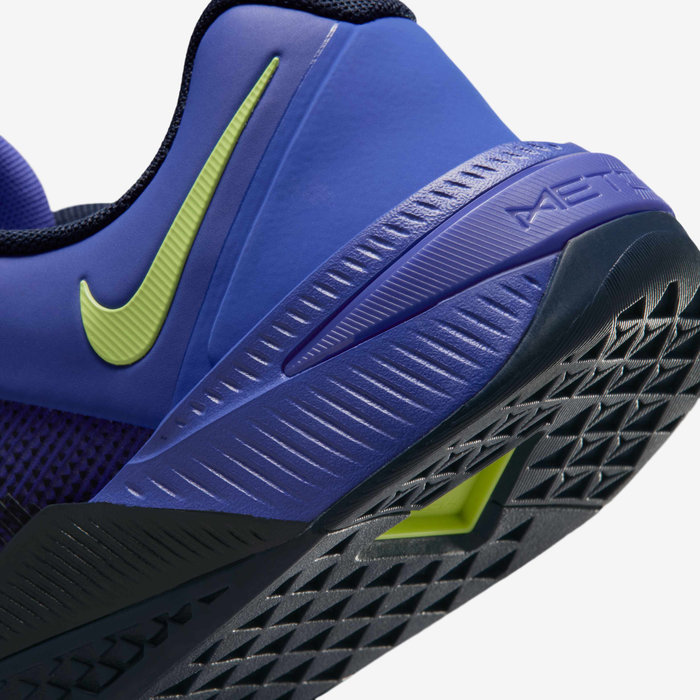 Nike Metcon 10 HJ1875-501 - Medial Forefoot Close-up showing Persian Violet Engineered Mesh Texture, Obsidian Forefoot Wrap with Rope Climb Texture, Metcon Strap with Lemon Twist Logo, Persian Violet Midsole & Diamond-Pattern Obsidian Rubber Outsole