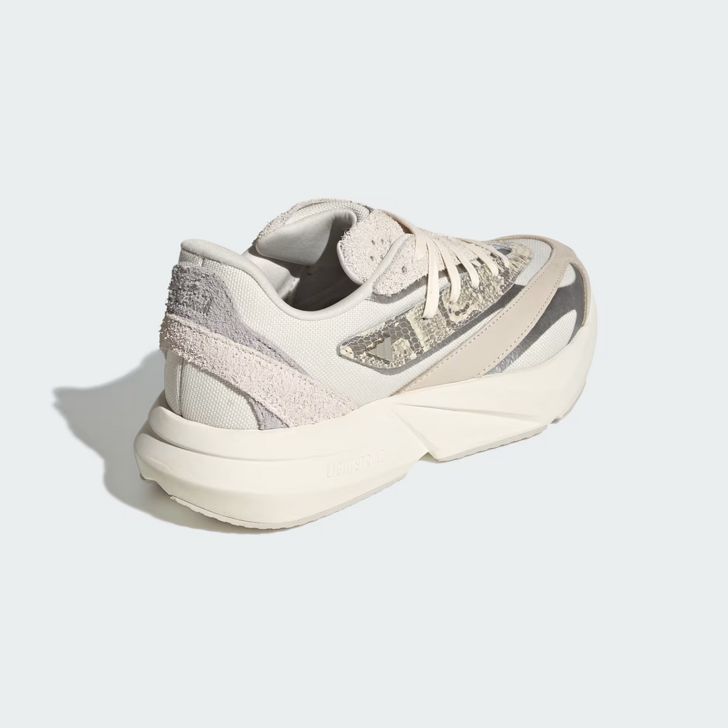 Adidas Lightblaze JQ7221 - Clean Lateral Profile on White Background in Off White/Silver Metallic/Grey One showing Full Silhouette, Snakeskin Mesh Panels, Silver Metallic Three Stripes Badge, Crinkled Suede Overlays & Chunky Lightstrike Midsole