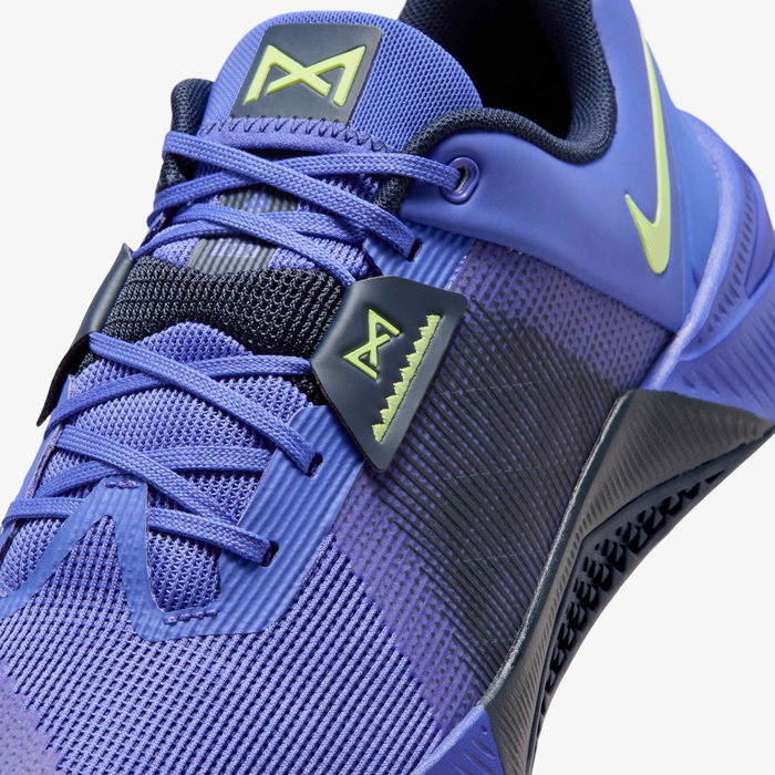 Nike Metcon 10 HJ1875-501 - Lateral Forefoot & Strap Close-up showing Persian Violet Mesh Upper, Light Lemon Twist Swoosh, Obsidian Forefoot Wrap with Rope Climb Texture, Metcon Strap with Lemon Twist Logo & Obsidian Rubber Outsole Edge