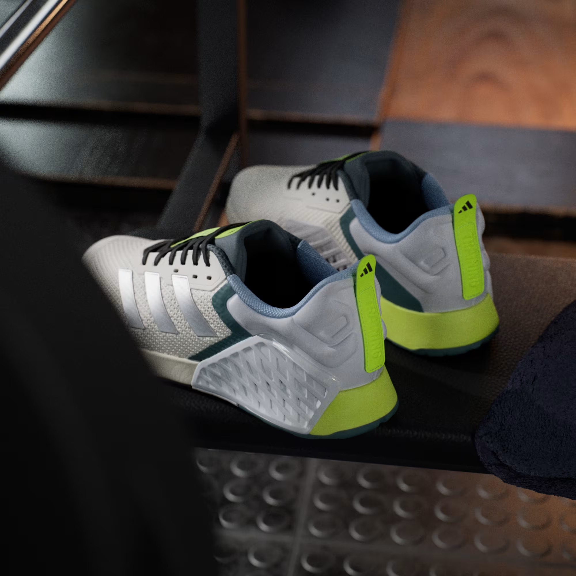 Adidas Dropset 3 JR1762 - Front 3/4 Pair Shot with Outsole Visible on Metal Gym Platform showing HEAT.RDY Lace Dubrae, Silver Three Stripes, Neon Yellow Accents, geoFit Collar & Black Rubber Outsole with Adidas Logo