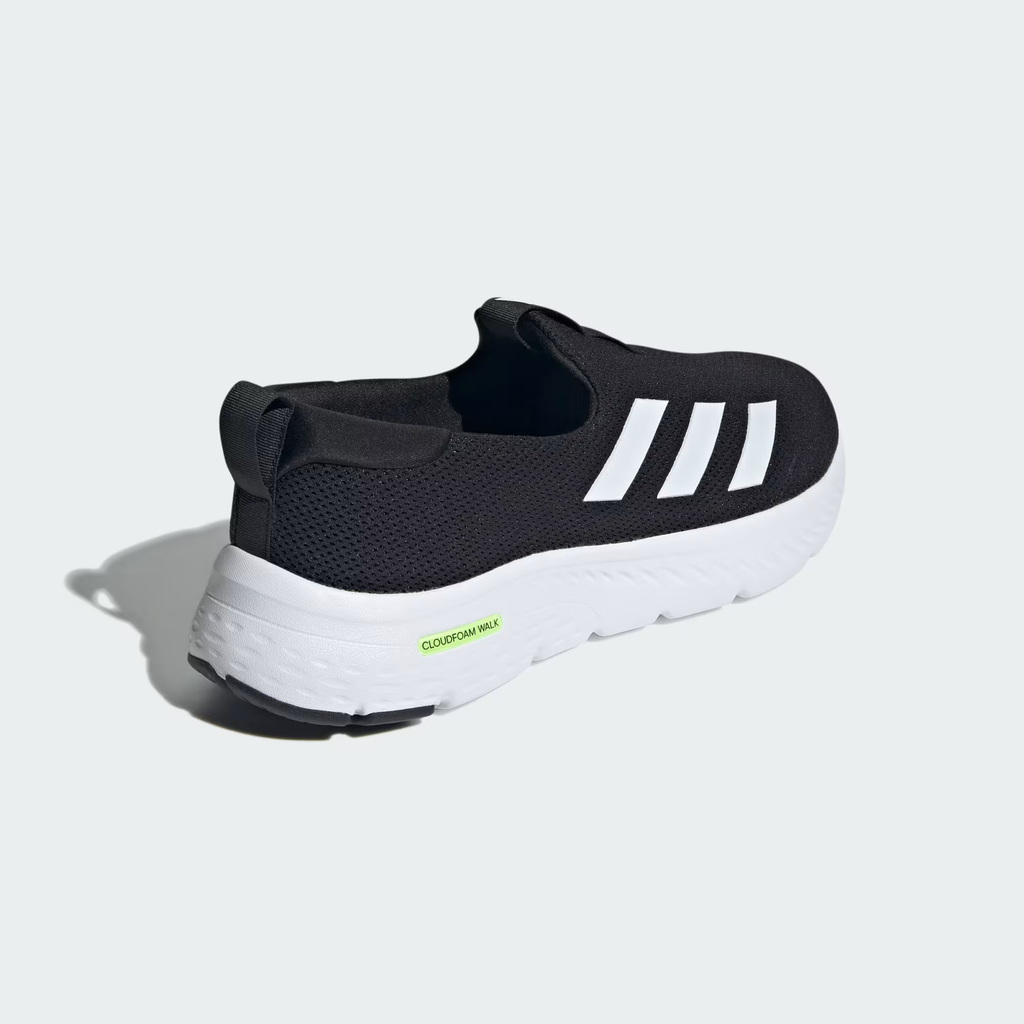 Adidas Cloudfoam Move Lounger ID6512 - Clean Medial Profile on Light Grey Background showing Core Black Engineered Mesh Upper, Laceless Slip-On Construction, Front & Heel Pull Tabs, Cloud White Full-Length Cloudfoam Walk Midsole with Segmented Bubble Detail & Black Rubber Outsole