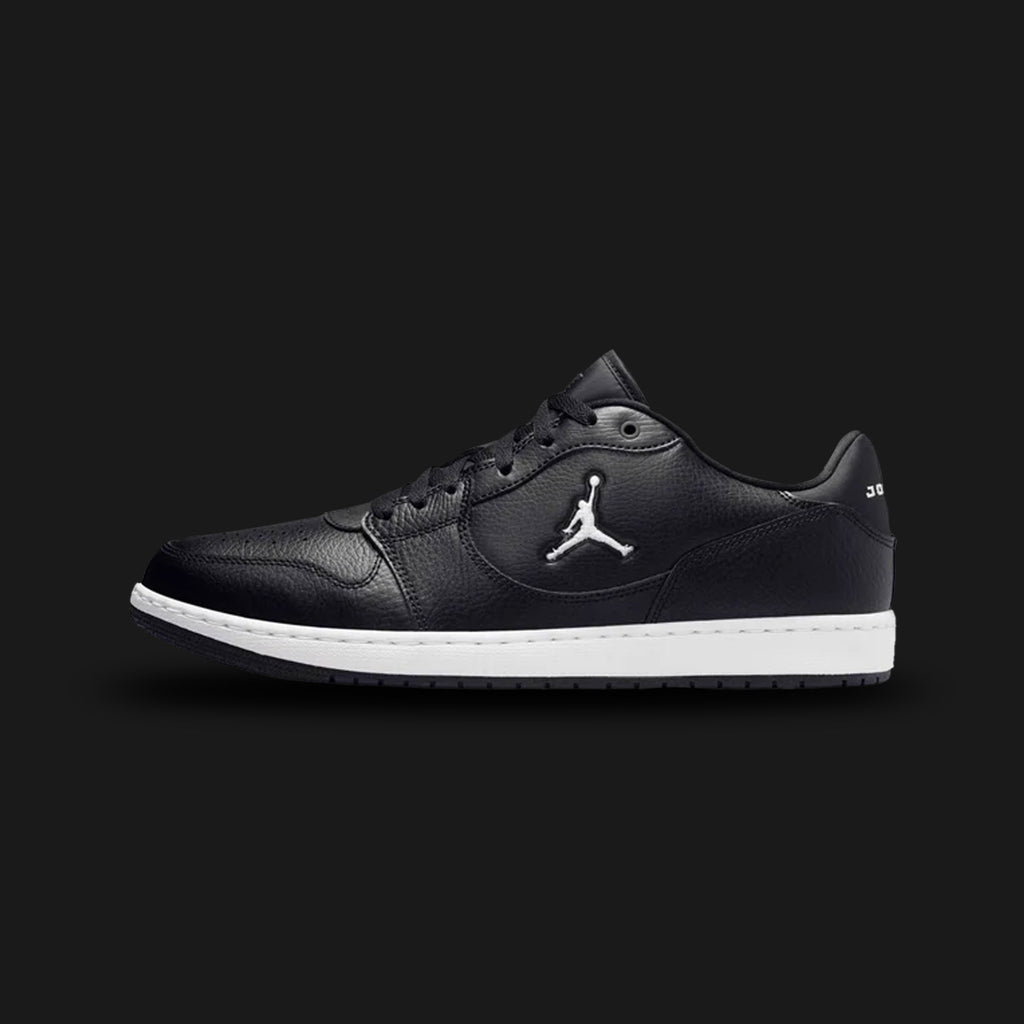 Jordan Court Connect Low shoes in Black and White (IQ5698-001). Features a sleek leather upper with breathable mesh panels, responsive encapsulated cushioning, embroidered Jumpman branding, and a durable rubber cupsole. Luxuntique guarantees 100% authentic footwear.
