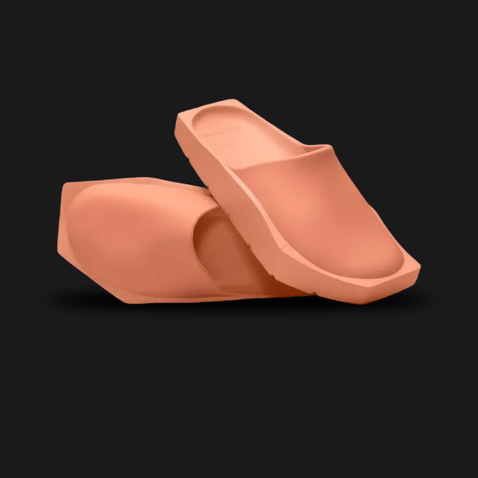 Jordan Hex Mule in Amber Brown (DX6405-201). Features a geometric, hexagonal bio-foam construction in a solid monochrome Amber Brown. Minimalist design with a squared toe, grooved footbed for comfort, and subtle Jumpman branding. Durable traction outsole. Luxuntique offers 100% authentic Jordan slides in Sri Lanka.