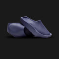 Jordan Hex Mule in Sky J Purple (DX6405-500). Features a geometric, hexagonal bio-foam construction in a solid monochrome Sky J Purple finish. Minimalist design with a squared toe, grooved footbed, and subtle Jumpman branding. Durable traction outsole. Luxuntique offers 100% authentic Jordan slides in Sri Lanka.