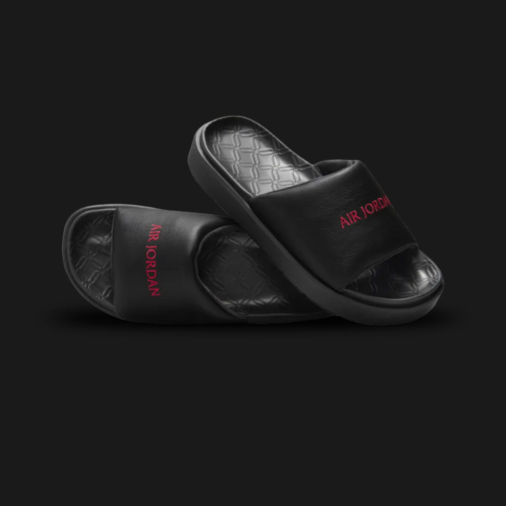Jordan Sophia women's slides in Black and Gym Red (DO8863-001). Featuring a premium criss-cross padded strap with soft lining and a Gym Red Jumpman logo. Elevated platform foam midsole with Air cushioning and a durable rubber outsole. Luxuntique offers 100% authentic Jordan slides in Sri Lanka.