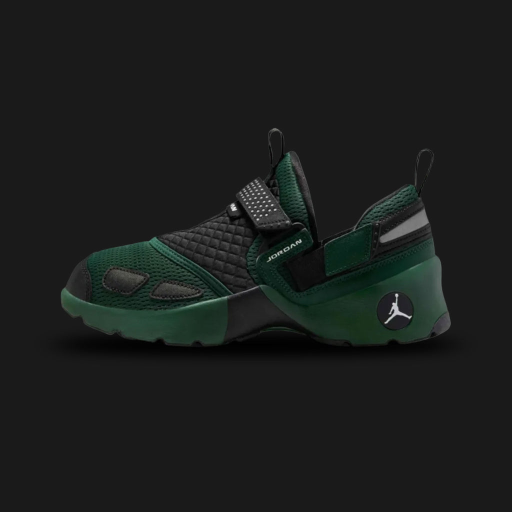 Jordan Trunner LX trainers in Fir green, Reflective Silver, and Black (HQ2164-300). Features a deep forest green upper with a signature three-strap lockdown system and woven midfoot panels. Accented by high-vis Reflective Silver details on a White midsole. Luxuntique offers 100% authentic Jordan footwear in Sri Lanka.