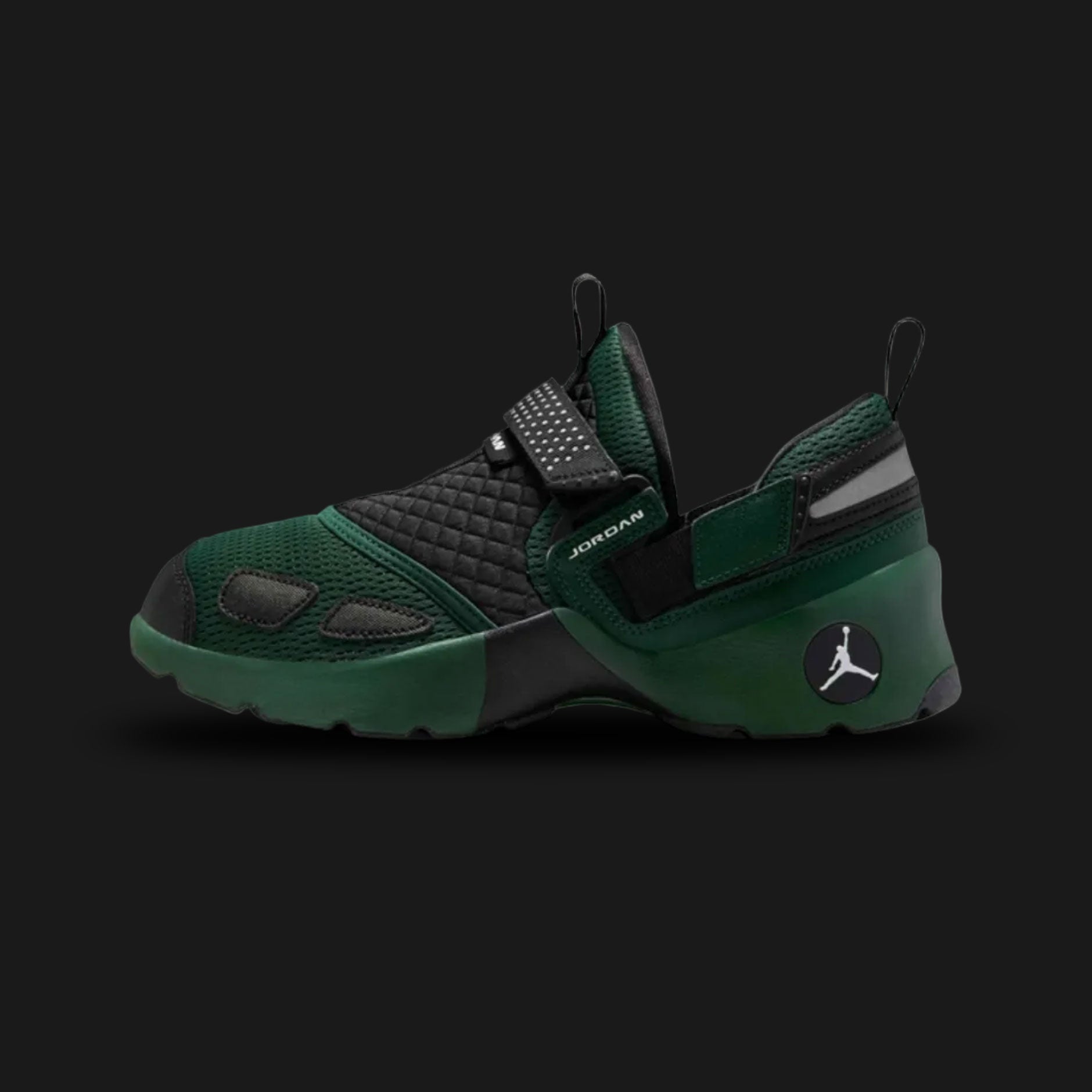 Jordan Trunner LX trainers in Fir green, Reflective Silver, and Black (HQ2164-300). Features a deep forest green upper with a signature three-strap lockdown system and woven midfoot panels. Accented by high-vis Reflective Silver details on a White midsole. Luxuntique offers 100% authentic Jordan footwear in Sri Lanka.