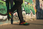 Legs against graffiti wall in Colombo