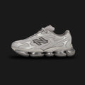 New Balance ABZORB 2000 shoes in Silver Metallic (U20005UW). Features a tech-mesh upper with reflective curvilinear overlays, a segmented full-length ABZORB sole unit, and ABZORB SBS heel pods for maximum stability. Luxuntique guarantees 100% authentic "New Balance" footwear in Sri Lanka.