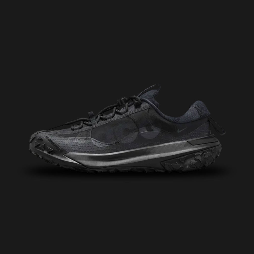 Nike ACG Mountain Fly 2 Low in Black and Anthracite (Design Code: DV7903-002). Featuring a high-traction lugged rubber outsole extending onto the sidewalls, a quick-lace system, and a durable synthetic upper for all-terrain performance. Luxuntique offers 100% authentic Nike ACG sneakers at the lowest price in Sri Lanka.