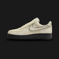 Nike Air Force 1 '07 LV8 in Light Khaki and Black (Design Code: NKHQ1966-200). Featuring premium suede and canvas overlays, a black contrast swoosh, and encapsulated Air-Sole cushioning. Luxuntique offers 100% authentic Nike Air Force 1 sneakers at the lowest price in Sri Lanka.
