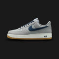 Nike Air Force 1 '07 LV8 in Light Smoke Grey, Armoury Navy, and Summit White with a Gum Light Brown sole (Design Code: NKIB6388-003). Featuring premium leather overlays, encapsulated Air-Sole cushioning, and a classic pivot-point gum outsole. Luxuntique offers 100% authentic Nike Air Force 1 sneakers at the lowest price in Sri Lanka.