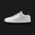Nike Air Force 1 '07 Mini Jewel in White, Metallic Gold, and Black (IB6543-101). Features a premium crisp white leather upper with a small, raised Metallic Gold jewel Swoosh and black branding accents. Classic chunky AF1 midsole with encapsulated Air cushioning. Luxuntique offers 100% authentic Nike footwear in Sri Lanka.