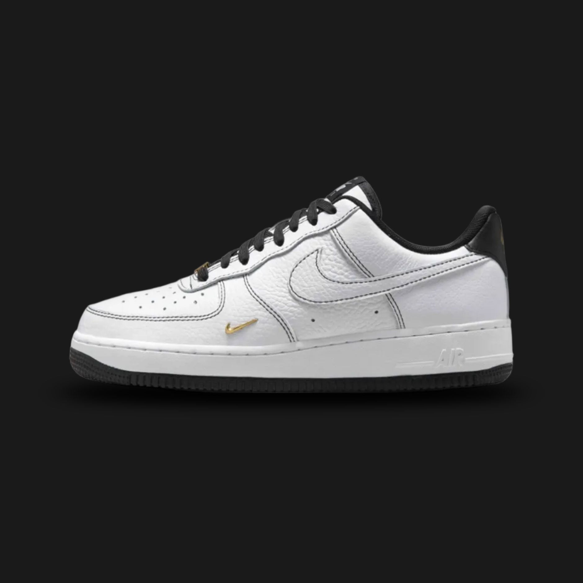 Nike Air Force 1 '07 Mini Jewel in White, Metallic Gold, and Black (IB6543-101). Features a premium crisp white leather upper with a small, raised Metallic Gold jewel Swoosh and black branding accents. Classic chunky AF1 midsole with encapsulated Air cushioning. Luxuntique offers 100% authentic Nike footwear in Sri Lanka.