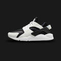 Nike Air Huarache lifestyle running shoes in Black and White (Design Code: DD1068-001). Featuring a signature foot-hugging black neoprene inner sleeve surrounded by durable black leather and textile overlays for a custom fit. Defined by its iconic black plastic heel clip and stripped-away branding, all resting on a plush, contrasting crisp white foam midsole with encapsulated Nike Air cushioning. Luxuntique offers 100% authentic Nike retro sneakers at the lowest price in Sri Lanka.