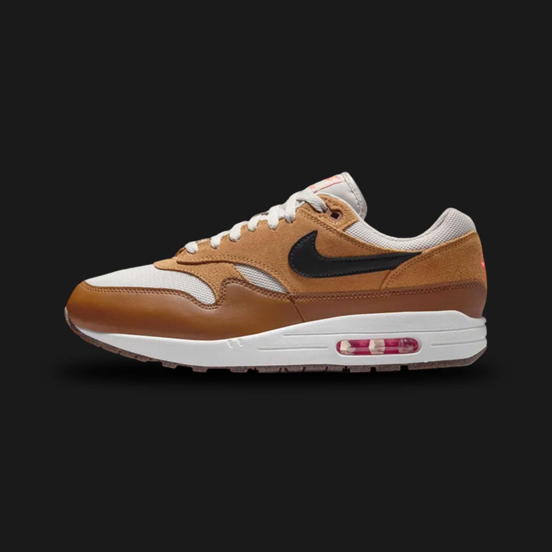 Nike Air Max 1 Essential shoes in Light Bone, Flax, British Tan, and Black (Design Code: FZ5808-004). Featuring a premium mixed-material upper with a breathable Light Bone mesh base and rich British Tan suede mudguards. Accented with warm Flax overlays and a sharp Black Swoosh for a sophisticated earth-tone look. Built on a foam midsole with the iconic visible Max Air unit in the heel. Luxuntique offers 100% authentic Nike Air Max sneakers at the lowest price in Sri Lanka.