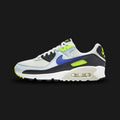 White Nike Air Max 90 sneaker with black, blue, and green accents (Design code: NKDH8010-102). Luxuntique offers 100% authentic Nike Air Max sneakers at the lowest prices in Sri Lanka.