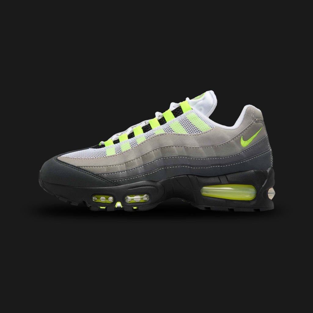 Nike Air Max 95 Big Bubble shoes in Black, Anthracite, Light Graphite, and Neon Yellow (IO9926-001). Features a classic anatomy-inspired layered upper of breathable mesh and synthetic suede in a descending dark grey-to-black gradient. Includes vibrant Neon Yellow lace loops, branding, and oversized visible Big Bubble Max Air cushioning units in the black foam midsole. Luxuntique offers 100% authentic Nike footwear in Sri Lanka.
