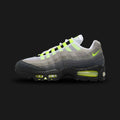 Nike Air Max 95 Big Bubble shoes in Black, Anthracite, Light Graphite, and Neon Yellow (IO9926-001). Features a classic anatomy-inspired layered upper of breathable mesh and synthetic suede in a descending dark grey-to-black gradient. Includes vibrant Neon Yellow lace loops, branding, and oversized visible Big Bubble Max Air cushioning units in the black foam midsole. Luxuntique offers 100% authentic Nike footwear in Sri Lanka.