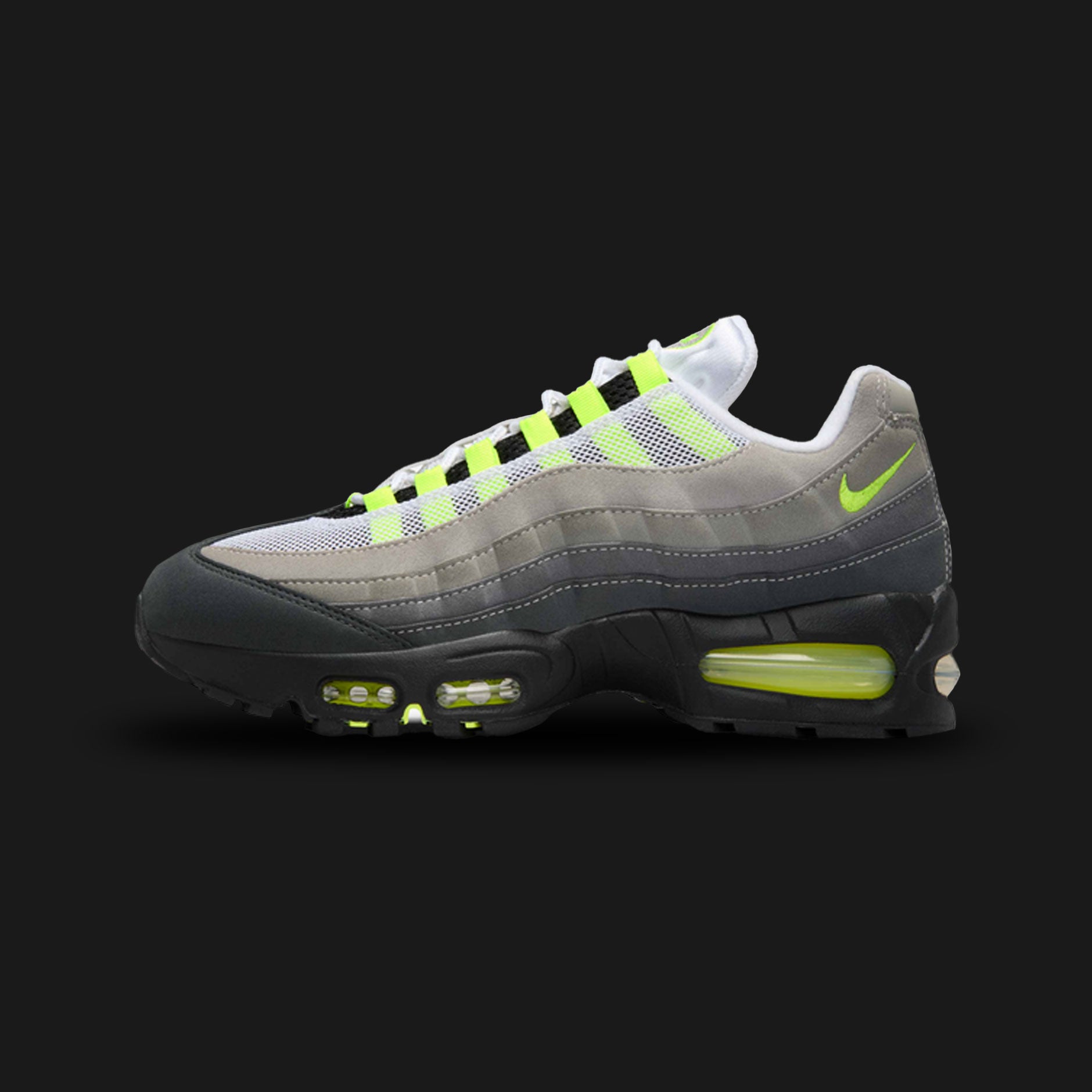 Nike Air Max 95 Big Bubble shoes in Black, Anthracite, Light Graphite, and Neon Yellow (IO9926-001). Features a classic anatomy-inspired layered upper of breathable mesh and synthetic suede in a descending dark grey-to-black gradient. Includes vibrant Neon Yellow lace loops, branding, and oversized visible Big Bubble Max Air cushioning units in the black foam midsole. Luxuntique offers 100% authentic Nike footwear in Sri Lanka.