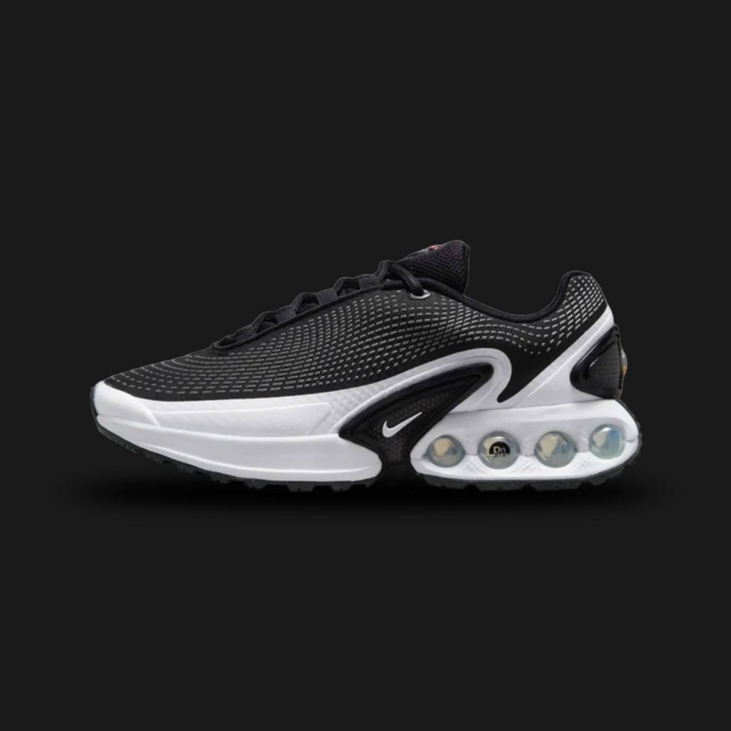 Nike Air Max Dn in Black, Cool Grey, and Pure Platinum (FJ3145-002). Features a Black haptic textured upper and the revolutionary Dynamic Air four-tube system in the heel. Accented by Metallic Silver midfoot shanks. Luxuntique offers 100% authentic Nike footwear in Sri Lanka.