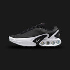 Nike Air Max Dn in Black, Cool Grey, and Pure Platinum (FJ3145-002). Features a Black haptic textured upper and the revolutionary Dynamic Air four-tube system in the heel. Accented by Metallic Silver midfoot shanks. Luxuntique offers 100% authentic Nike footwear in Sri Lanka.